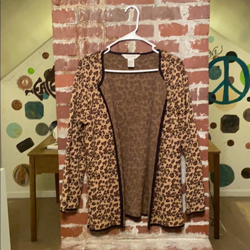 Open front hip length cardigan leap off print